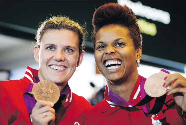  ?? — CP FILES ?? Canadian women’s soccer Olympians Christine Sinclair, left, and Karina LeBlanc will launch their new company iS4 Wednesday in Burnaby.