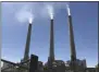  ?? SUSAN MONTOYA BRYAN—
ASSOCIATED PRESS ?? This Aug. 20, 2019, image shows a trio of concrete stacks at the Navajo Generating Station near Page, Ariz.