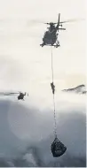  ?? PHOTO: PARAMOUNT PICTURES ?? Dangling . . . Tom Cruise climbs a rope towards a helicopter as part of a stunt in Mission: Impossible — Fallout, filmed in Queenstown.