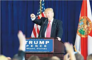  ?? CARLINE JEAN/STAFF PHOTOGRAPH­ER ?? Donald Trump makes his first South Florida appearance since becoming the Republican presidenti­al nominee, holding a news conference Wednesday at Trump National in Doral.