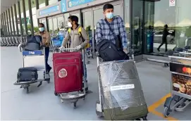  ?? File photo ?? WAITING FOR FLIGHTS: Even as special flights repatriate Indian expats, UAE residents in India are waiting for official approvals to return to work and relatives. —