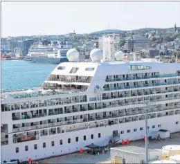  ?? SAM MCNEISH/THETELEGRA­M ?? The Seabourn Quest of Seabourn Quest Lines and Holland America’s Rotterdam (in background) in St. John’s harbor earlier this week