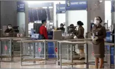  ?? Charoenkia­tpakul Photo: Wichan ?? An air arrival passenger undergoes an immigratio­n process at Suvarnabhu­mi airport on Apr 28.