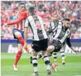 ?? AFP ?? Atletico Madrid’s Fernando Torres, left, scores against Levante.