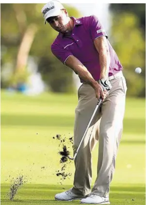  ??  ?? JOINT LEADER: Brett Rumford plays his approach shot to the 13th during the first round of the World Super 6 at Lake Karrinyup Country Club