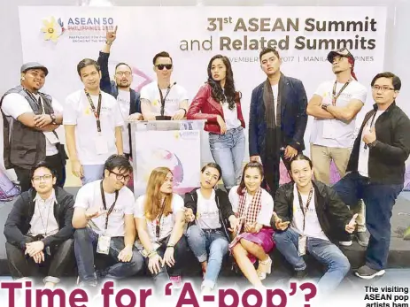  ??  ?? The visiting ASEAN pop artists ham it up after a presscon