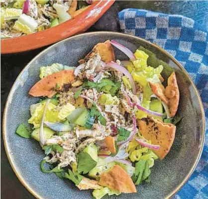  ?? GRETCHEN MCKAY/PITTSBURGH POST-GAZETTE ?? This version of fattoush includes shredded chicken tossed in a citrusy tahini-sumac dressing.