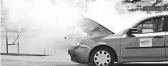 ??  ?? Demonstrat­ion on the effectiven­ess of the Elide Fire Extinguish­ing Ball in putting out fire in a vehicle.