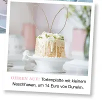  ??  ?? OHREN AUF! Tortenplat­te mit kleinem Naschhasen, um 14 Euro von Dunelm.