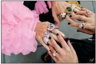  ?? (The New York Times/Simbarashe Cha) ?? Arezu Sohn and Nicole Gordon show off their rings