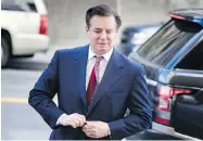  ?? BRENDAN SMIALOWSKI / AFP / GETTY IMAGES ?? Paul Manafort will remain in jail until his trial begins after allegedly contacting witnesses in his case.