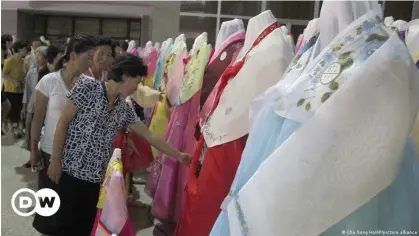  ?? ?? North Koreans are limited to a list of 'approved' clothing and hairstyles