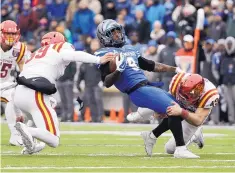  ?? MARK HUMPHREY/ASSOCIATED PRESS ?? Memphis receiver John Williams (9) is surrounded by Iowa State defenders during Saturday’s Liberty Bowl. It was his only catch of the game.