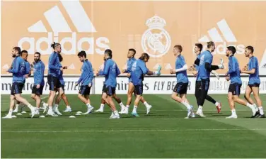  ?? Courtesy: Real Madrid Twitter ?? ↑
Real Madrid players attend a training session on Friday.