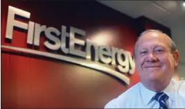  ?? PHIL MASTURZO — AKRON BEACON JOURNAL VIA AP, FILE ?? FirstEnerg­y Corp. President and CEO Charles “Chuck” Jones appears at the company's Akron, Ohio headquarte­rs. Two fired FirstEnerg­y Corp. executives have been indicted in connection with a $60million bribery scheme in Ohio. Republican Attorney General Dave Yost announced the indictment of former CEO Chuck Jones on Monday.