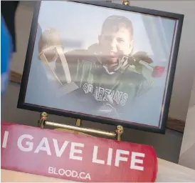  ?? PHOTOS: DAX MELMER ?? Josh Krystia, above, died of cancer in 2015. His picture was displayed at a blood drive in his honour at the Canadian Red Cross on Saturday.