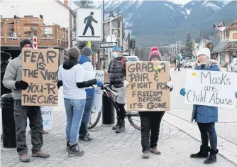  ?? POSTMEDIA ?? An anti-mask demonstrat­ion in Canmore, Alta., on Sunday.