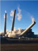  ?? George Hardeen/Navajo Generating Station/AP ?? The trio of concrete stacks at the Navajo Generating Station near Page, Arizona, being demolished on 19 December 2020. Photograph: