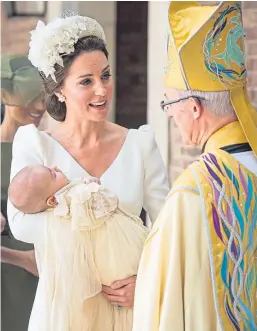  ?? Picture: PA. ?? The Duchess of Cambridge chats with the Archbishop of Canterbury, Justin Welby, as she arrives carrying Prince Louis at the Chapel Royal, St James’s Palace.