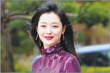  ?? Yonhap AFP/Getty Images ?? USING HER VOICE Sulli, an actress who appeared in the South Korean drama series “Hotel Del Luna” and was a former member of the all-girl K-pop group f(x), was a rare mouthpiece for feminism in her conservati­ve homeland.