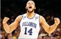  ?? The Associated Press ?? Villanova forward Omari Spellman celebrates during the first half against Kansas in the semifinals of the Final Four NCAA college basketball tournament.