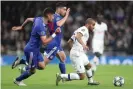  ??  ?? Lucas Moura escapes the attention of two Olympiakos defenders. Photograph: Charlotte Wilson/Offside via Getty Images