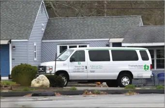  ?? CONTRIBUTE­D — CAPE COD CONCERNED CITIZENS ?? A van is seen Wednesday outside Harborside Suites in Yarmouth where migrant families are being relocated from to shelter sites off of Cape Cod.