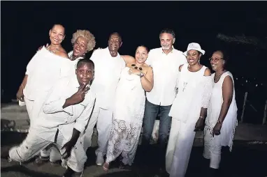  ??  ?? From left: Andrea Davidson, Michelle Bingham, Lloyd ‘Clive’ Baker, Angela Escoffery, Michael and Colleen Hall, Debbie Archer, and (in front), Damani Baker having a grand time.