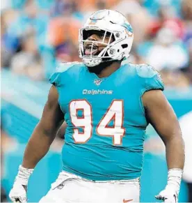  ?? BRYNN ANDERSON/AP ?? Dolphins defensive tackle Christian Wilkins’ grandfathe­r was the victim of an accidental discharge of a police firearm in 2011.