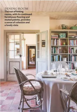  ??  ?? DINING ROOM The run of linking rooms, with its continued farmhouse flooring and muted palette, provides a sense of cohesion and a lovely vista