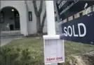  ?? David Zalubowski/Associated Press ?? A sold sign is shown outside a home in Denver in March 2018.