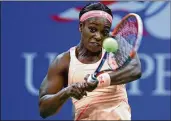  ?? CLIVE BRUNSKILL / GETTY IMAGES ?? Sloane Stephens eyes a return during her 6-1, 0-6, 7-5 victory over Venus Williams as she earns her first berth in a major championsh­ip match.