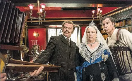  ??  ?? Dr. John Watson (John C. Reilly) and Sherlock Holmes (Will Ferrell) pose for a “self-photograph” with Queen Victoria (Pam Ferris) in the elementary comedy Holmes &amp; Watson.