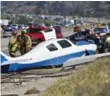  ??  ?? One person was killed in a plane crash Saturday on a freeway in Fallbrook, Calif.