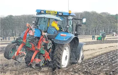  ?? Pictures: Ron Stephen. ?? Above: Scottish champion Dave Carnegie in the reversible ploughing butts; below left: David Duncan, from Montrose, with his pair of Clydesdale­s; below right: Alec Cumming, from Kinross, with his 1938 John Deere in the horticultu­ral class.