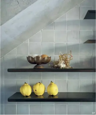  ?? ?? 07 Storage shelves mirror the home’s aesthetic: clean lines and repeating rounded forms.