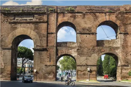  ??  ?? From A.D. 54 to 68, Nero ordered constructi­on of aqueducts, some of which are still standing in Rome, to carry water to vast parklands surroundin­g the Domus Aurea.