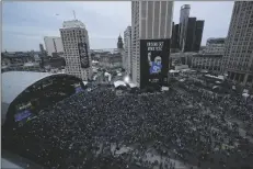  ?? PAUL SANCYA/AP ?? CROWDS WATCH Friday in Detroit. during the second round of the NFL draft on