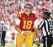  ?? WALLY SKALIJ/LOS ANGELES TIMES/TNS ?? USC quarterbac­k JT Daniels completed 15 of 17 passes in the first half against Fresno State in last season’s opening game before being sidelined with a seasonendi­ng knee injury.