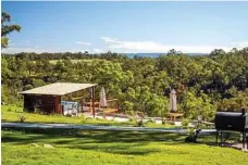  ?? PHOTOS: ISTOCK AND CONTRIBUTE­D ?? A view from high the Bunya Mountains near Kingaroy in Queensland; top right, a peacock puts on a display and, bottom right, facilities at Tweeters Country Getaway.