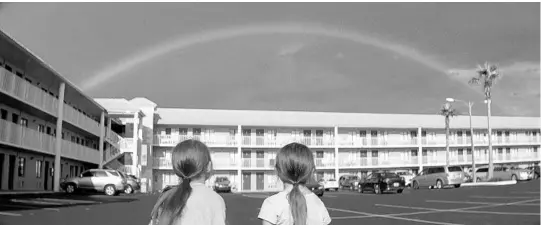  ?? MARC SCHMIDT /A24 ?? Valeria Cotto, left, of Davenport, and Brooklynn Prince of Winter Springs are shown in a memorable scene from “The Florida Project.” The movie filmed last year near Walt Disney World.
