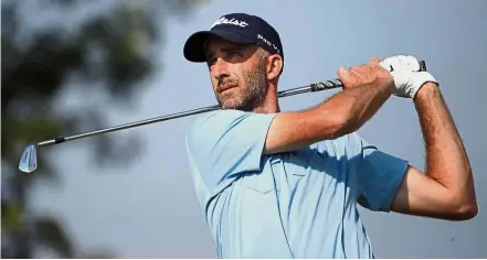  ??  ?? Good round: Australian Geoff Ogilvy teeing off at the 17th hole during the second round of the Quicken Loans National at TPC Potomac on Friday. – Reuters