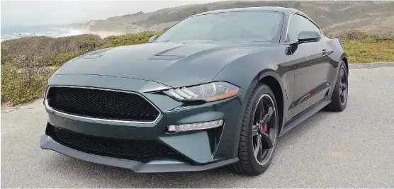  ?? NEIL VORANO ?? The 2019 Ford Mustang Bullitt is offered in Dark Highland Green similar to the original 1968 Mustang that Steve McQueen drove in the famous film.