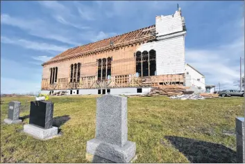  ?? TINA COMEAU ?? The former Holy Cross Roman Catholic Church in Plympton, Digby County, is being dismantled by hand.