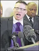  ?? BOB ANDRES / BANDRES@AJC.COM ?? Sir Maejor Page, who some see as a divisive force in civil rights, speaks at a news conference after Mayor Kasim Reed and police Chief George Turner (right) met with Black Lives Matters leaders at City Hall.