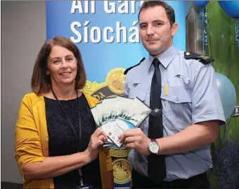  ??  ?? At the launch of Hotpital Watch in Our Lady of Lourdes last Thursday were Jackie Rooney who is chair of the Hospital Watch Committee and Garda Patrick Sheridan.