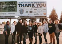  ?? Photo by Ashton Imagery ?? Back the Badge, Yuba Sutter board members and billboard sponsors stand in front of the second Back the Badge, Yuba Sutter billboard, located in the Airgas parking lot on Highway 20 just east of George Washington Boulevard, on Friday.