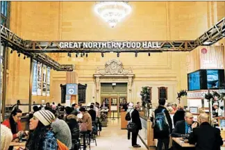  ??  ?? Great Northern Food Hall in Grand Central Terminal, opened by Claus Meyer, a Danish culinary entreprene­ur, offers Scandinavi­an-style pastries, sandwiches, breads and porridges in a buzzy, food court-style setting.