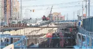  ??  ?? Constructi­on of the Eglinton Crosstown LRT route looking east to Kennedy station and the tunnel to the new station.