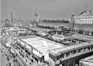  ?? — AFP photo ?? Red Square decorated for New Year celebratio­ns is pictured from a roof of the Moscow GUM State Department store. Russia’s prime minister dismissed the head of the statistics agency on Monday and appointed an economy ministry official to the post, with the government pledging to radically overhaul the body’s data gathering methods.